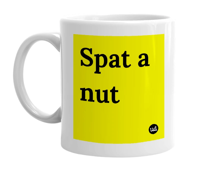 White mug with 'Spat a nut' in bold black letters