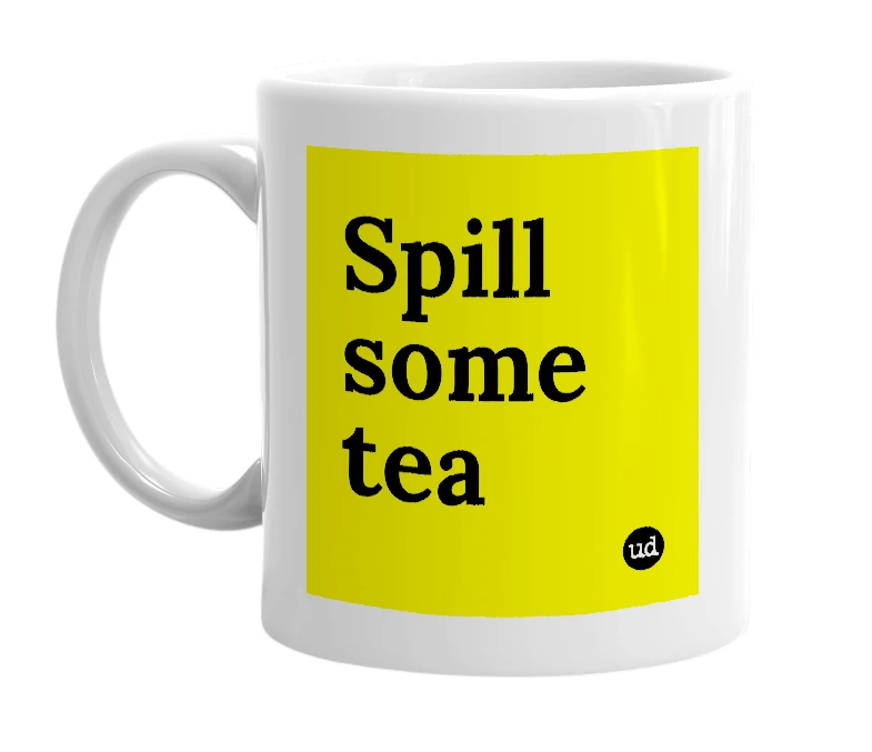 White mug with 'Spill some tea' in bold black letters