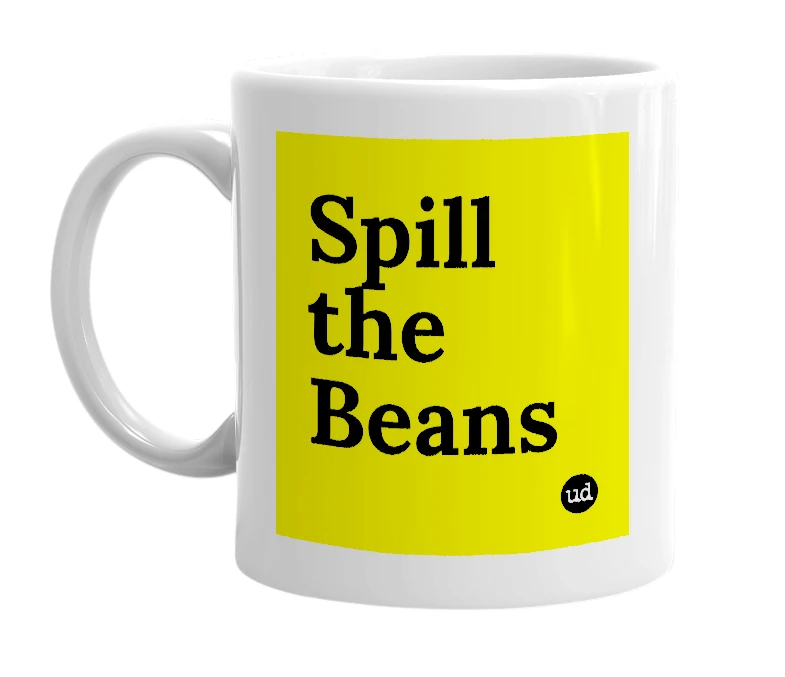 White mug with 'Spill the Beans' in bold black letters