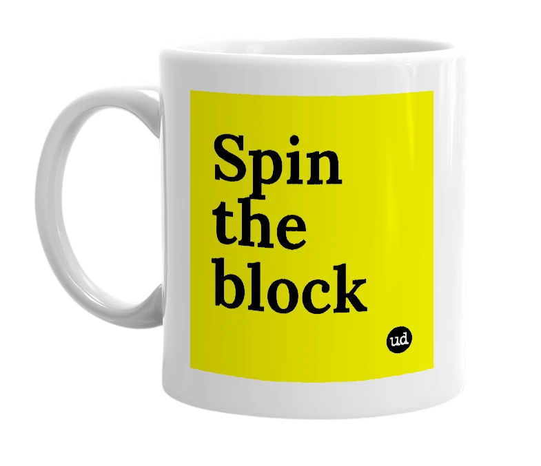 White mug with 'Spin the block' in bold black letters