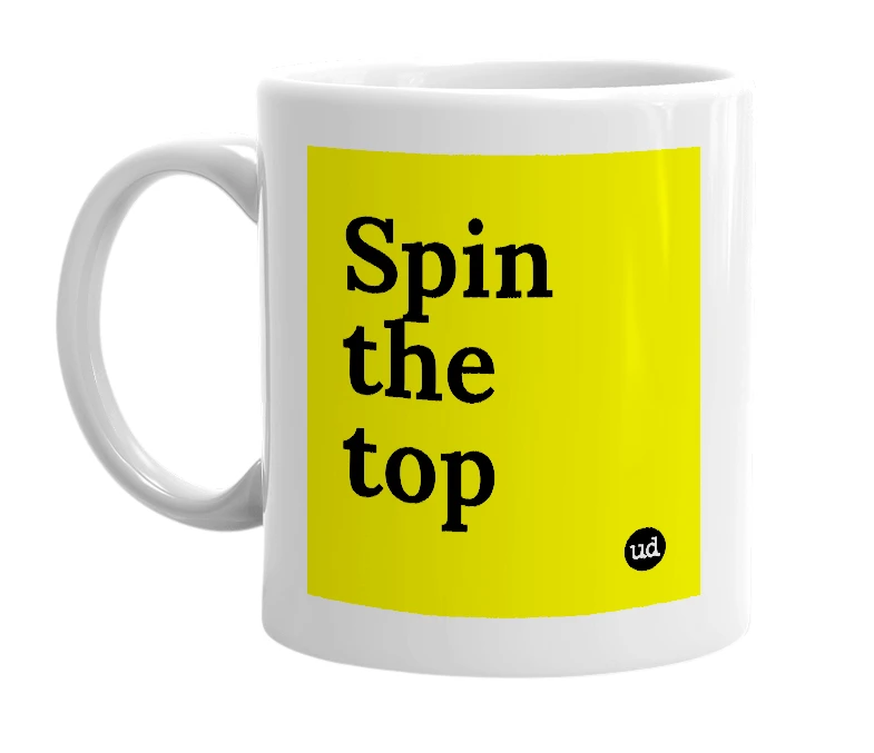 White mug with 'Spin the top' in bold black letters