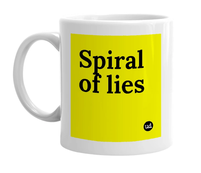 White mug with 'Spiral of lies' in bold black letters