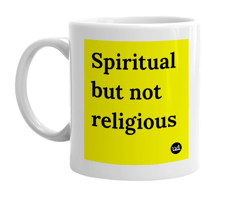 White mug with 'Spiritual but not religious' in bold black letters