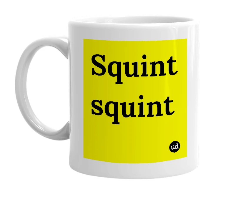 White mug with 'Squint squint' in bold black letters