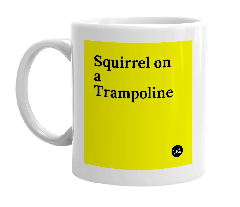 White mug with 'Squirrel on a Trampoline' in bold black letters