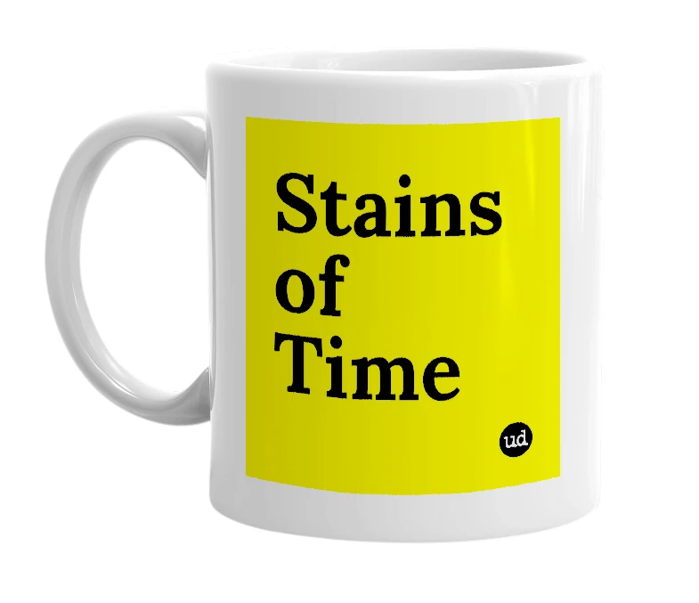 White mug with 'Stains of Time' in bold black letters