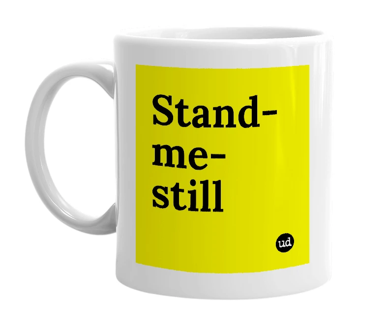 White mug with 'Stand-me-still' in bold black letters