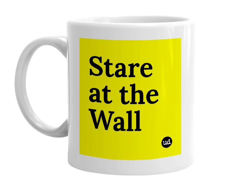 White mug with 'Stare at the Wall' in bold black letters