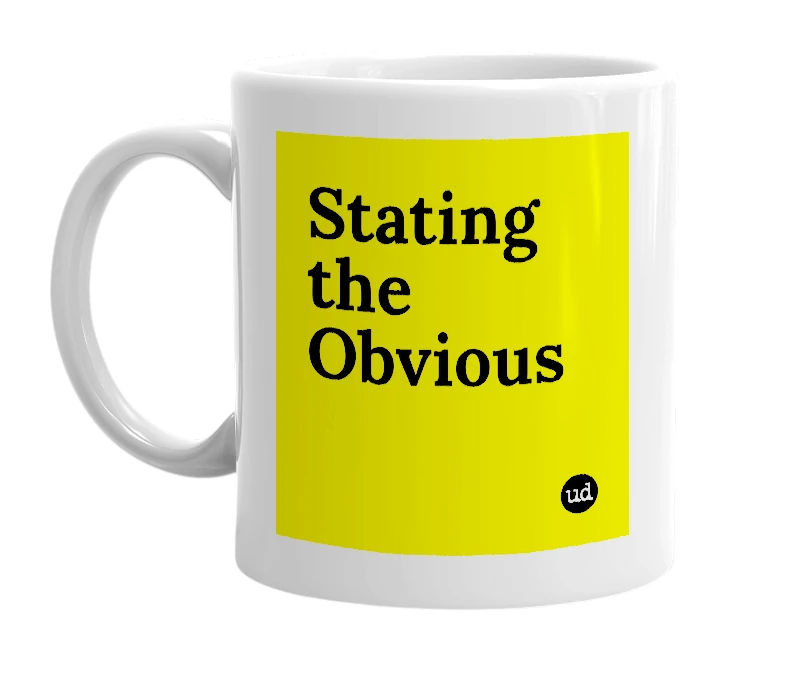 White mug with 'Stating the Obvious' in bold black letters