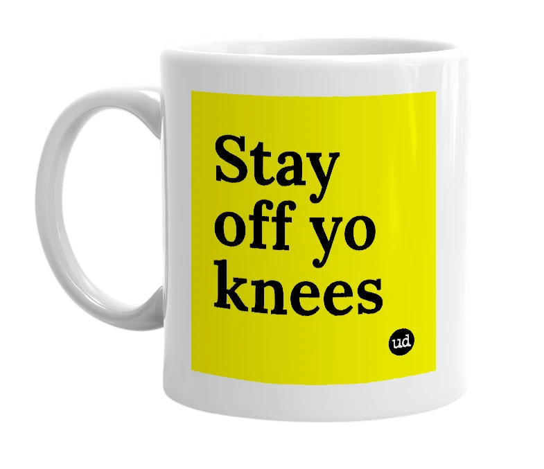 White mug with 'Stay off yo knees' in bold black letters