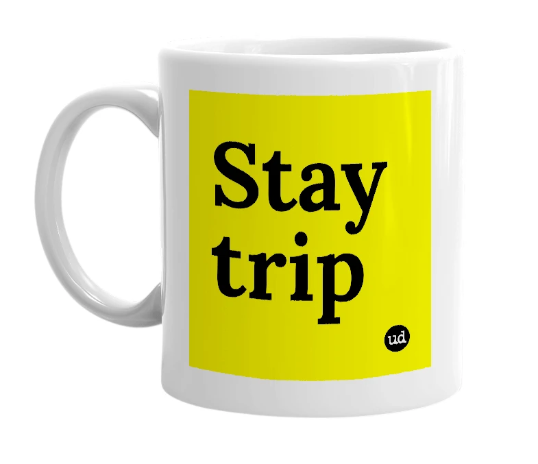 White mug with 'Stay trip' in bold black letters