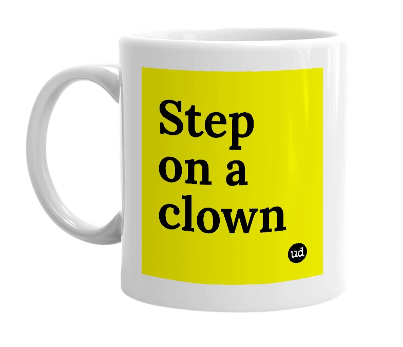 White mug with 'Step on a clown' in bold black letters