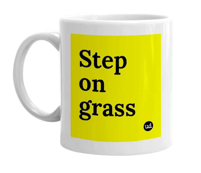White mug with 'Step on grass' in bold black letters