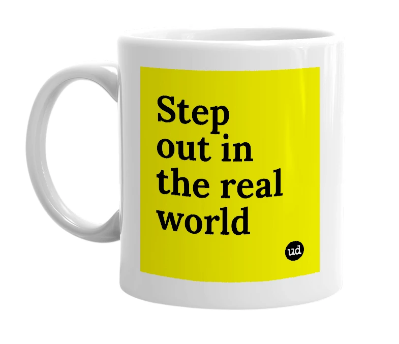 White mug with 'Step out in the real world' in bold black letters