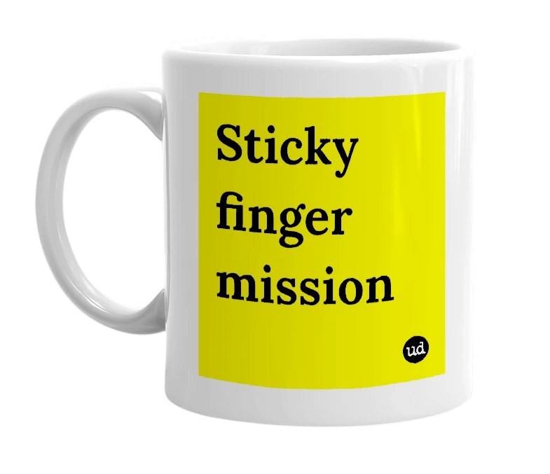 White mug with 'Sticky finger mission' in bold black letters
