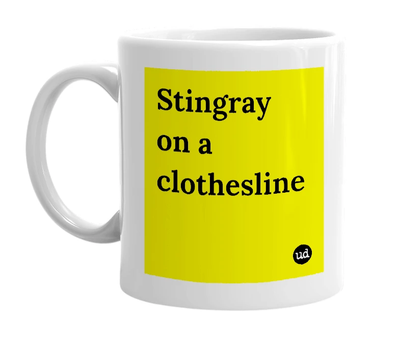White mug with 'Stingray on a clothesline' in bold black letters