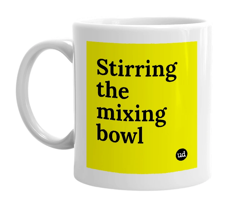 White mug with 'Stirring the mixing bowl' in bold black letters