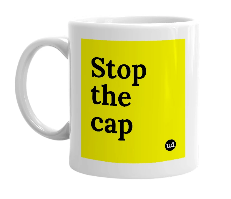 White mug with 'Stop the cap' in bold black letters