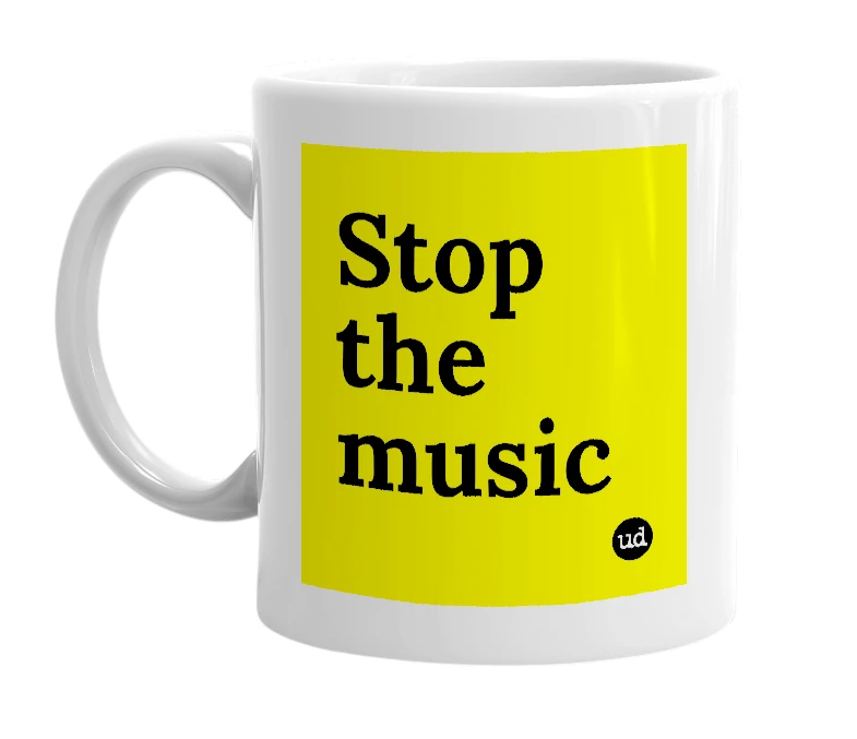 White mug with 'Stop the music' in bold black letters