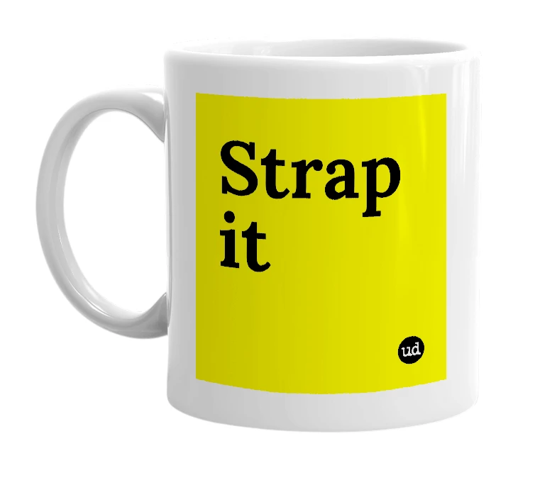 White mug with 'Strap it' in bold black letters