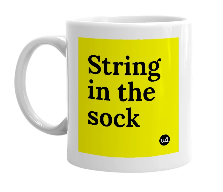 White mug with 'String in the sock' in bold black letters