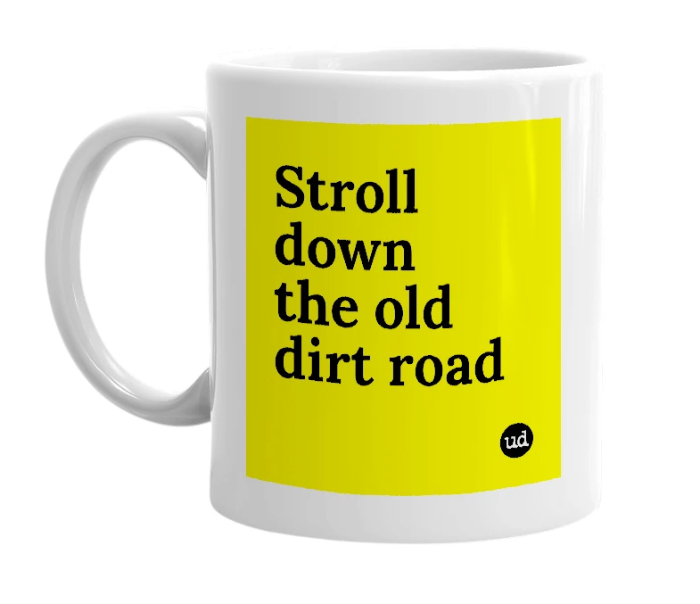 White mug with 'Stroll down the old dirt road' in bold black letters