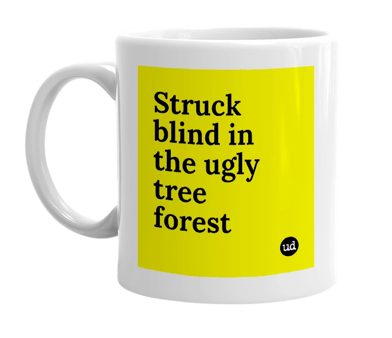 White mug with 'Struck blind in the ugly tree forest' in bold black letters