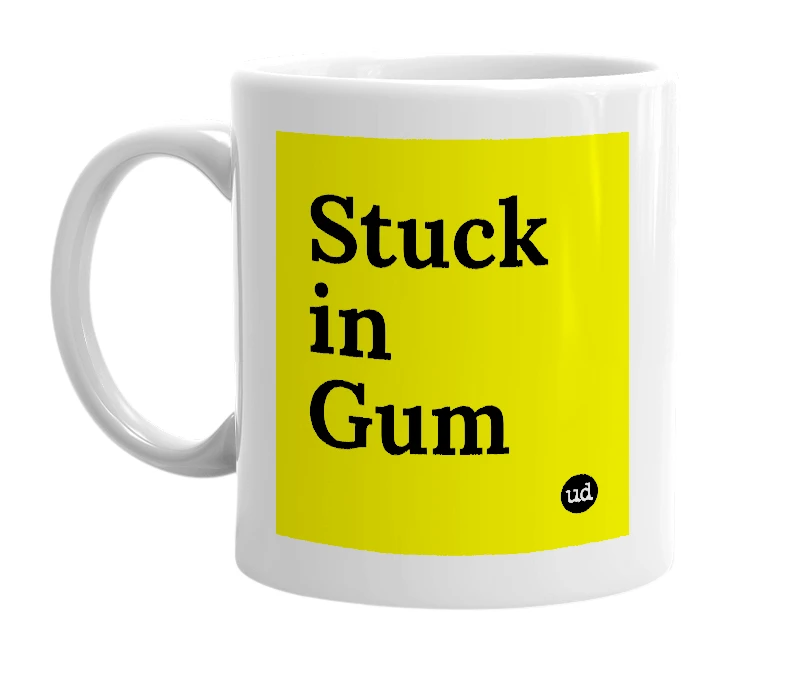 White mug with 'Stuck in Gum' in bold black letters