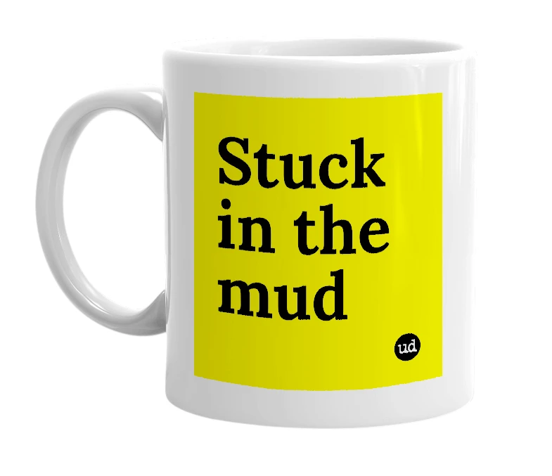 White mug with 'Stuck in the mud' in bold black letters