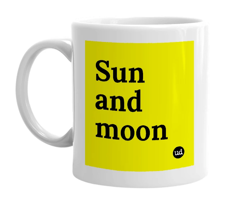 White mug with 'Sun and moon' in bold black letters