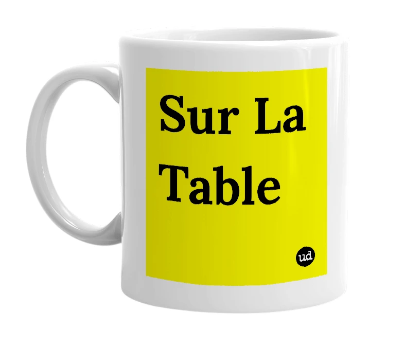 White mug with 'Sur La Table' in bold black letters
