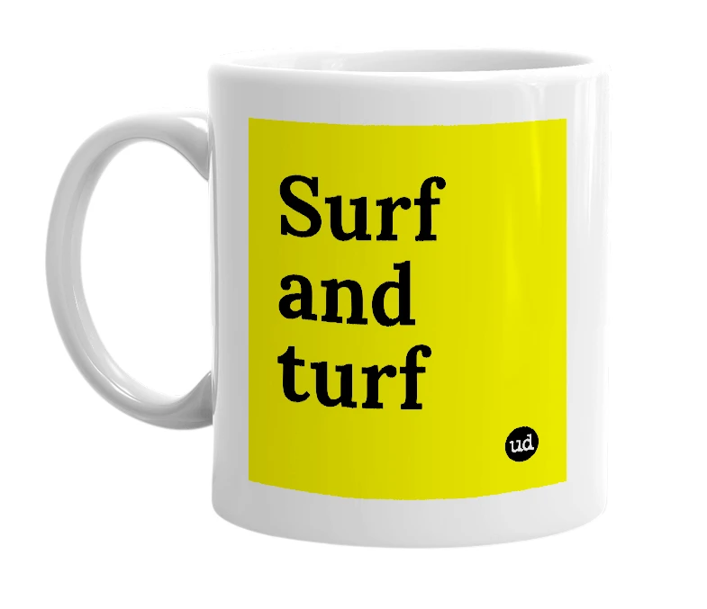 White mug with 'Surf and turf' in bold black letters