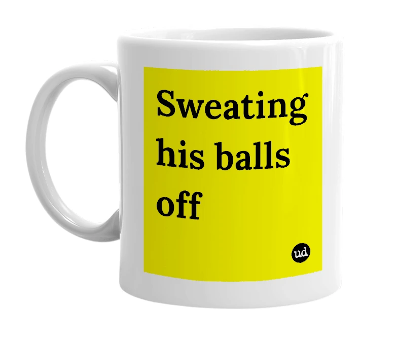 White mug with 'Sweating his balls off' in bold black letters
