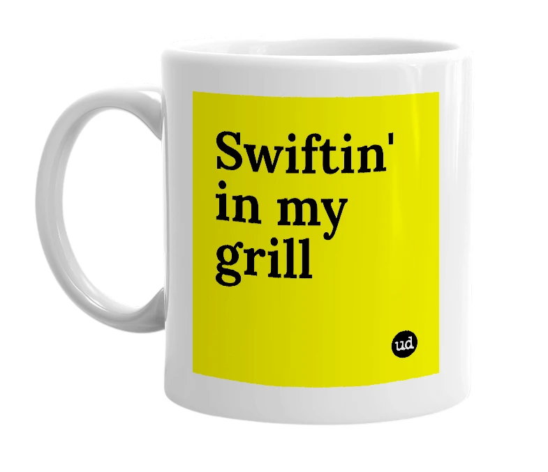 White mug with 'Swiftin' in my grill' in bold black letters