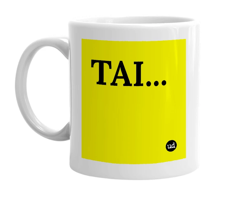 White mug with 'TAI...' in bold black letters