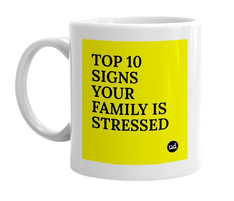 White mug with 'TOP 10 SIGNS YOUR FAMILY IS STRESSED' in bold black letters