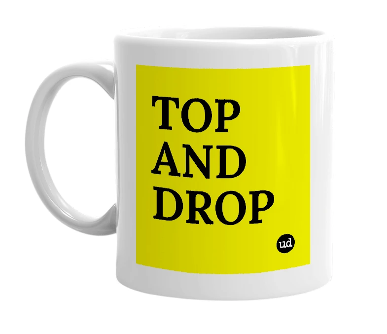 White mug with 'TOP AND DROP' in bold black letters