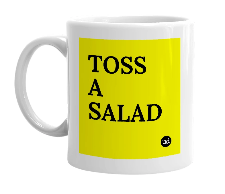 White mug with 'TOSS A SALAD' in bold black letters