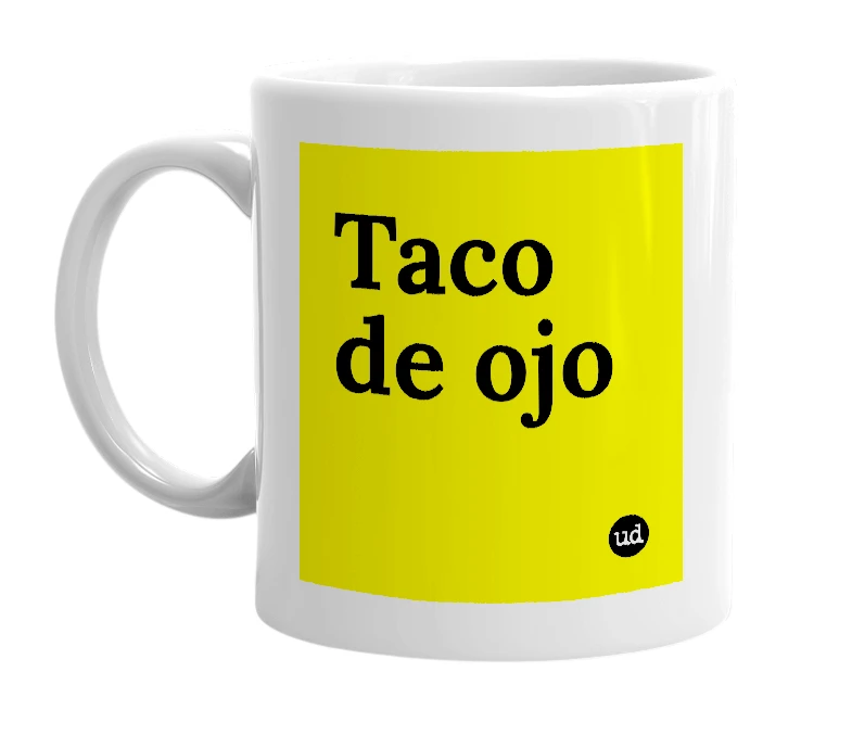 White mug with 'Taco de ojo' in bold black letters