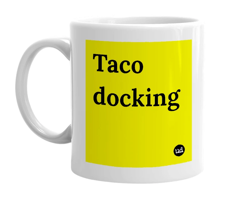 White mug with 'Taco docking' in bold black letters