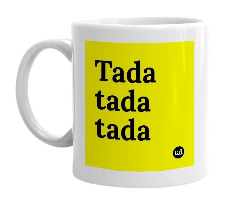 White mug with 'Tada tada tada' in bold black letters