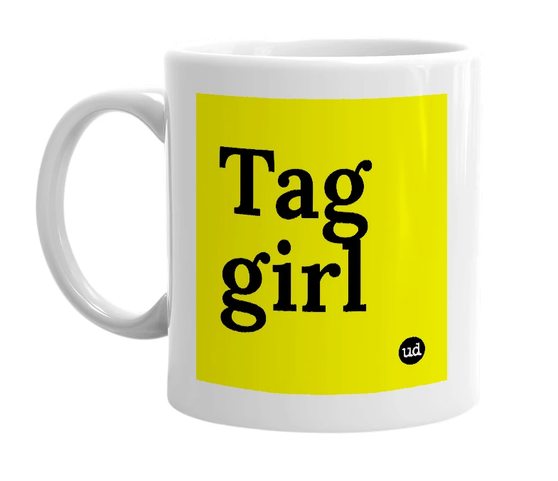 White mug with 'Tag girl' in bold black letters