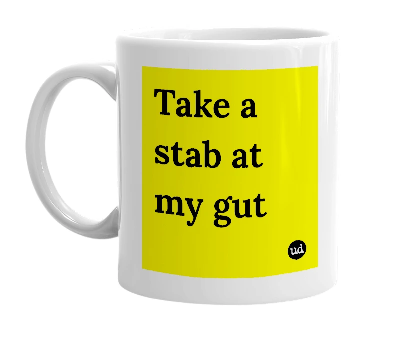 White mug with 'Take a stab at my gut' in bold black letters