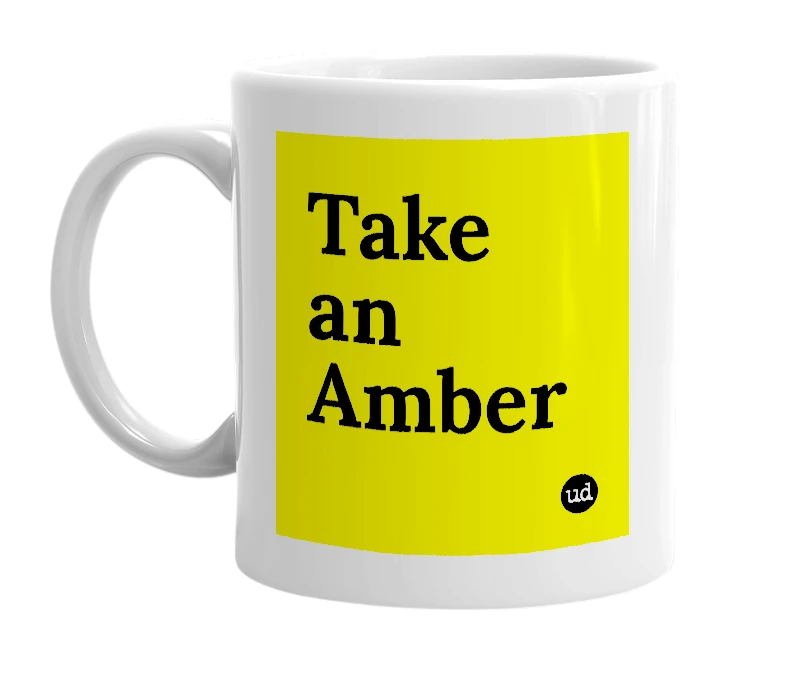 White mug with 'Take an Amber' in bold black letters