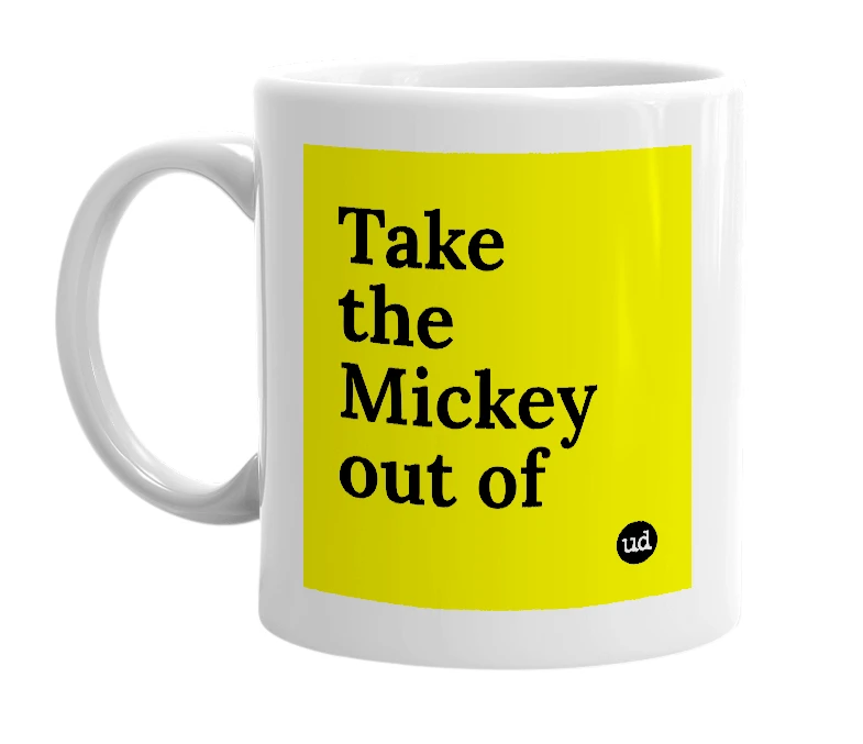 White mug with 'Take the Mickey out of' in bold black letters