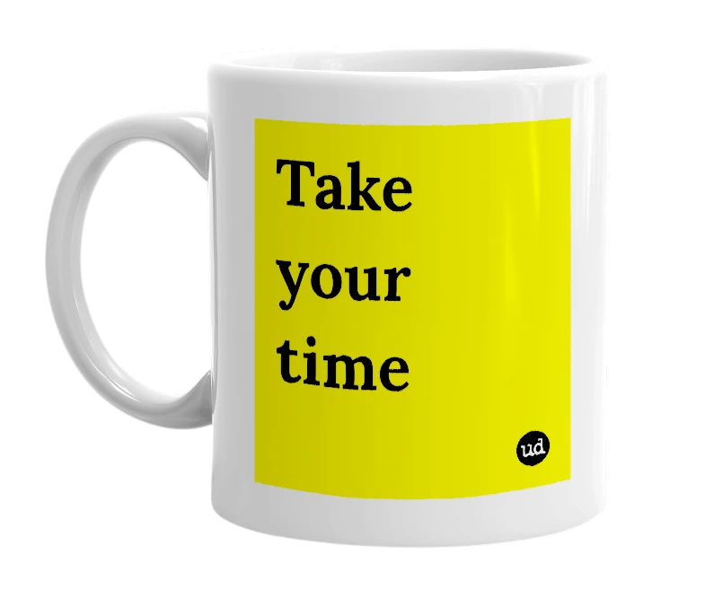 White mug with 'Take your time' in bold black letters