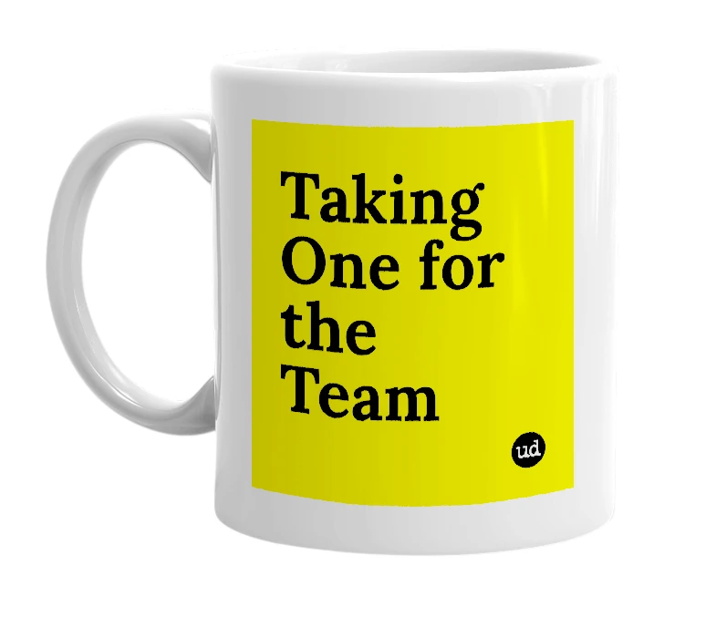 White mug with 'Taking One for the Team' in bold black letters