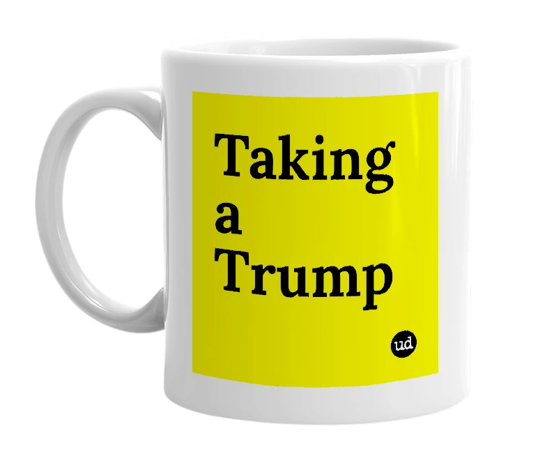 White mug with 'Taking a Trump' in bold black letters