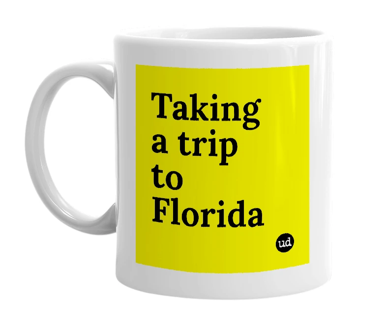 White mug with 'Taking a trip to Florida' in bold black letters