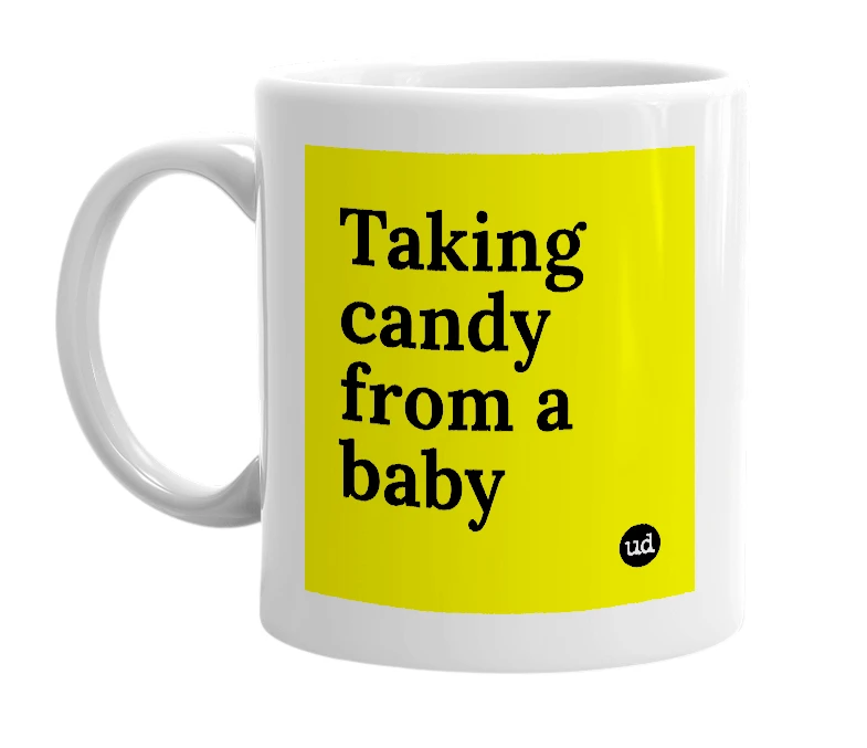 White mug with 'Taking candy from a baby' in bold black letters